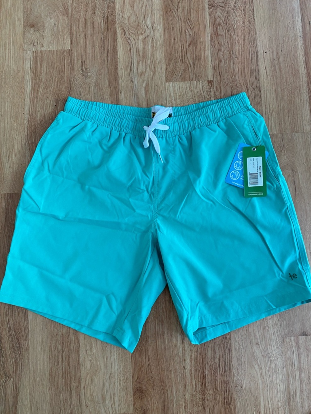 Tipsy Elves Disappearing Dino swim trunks NWT